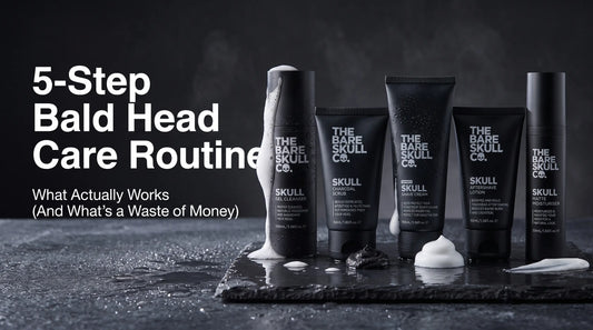 The Bare Skull Co. 5-Step Bald Head Care Routine: Skull Charcoal Scrub, Skull Gel Cleanser, Modern Skull Shave Cream, Skull Aftershave Lotion and Skull Matte Moisturiser arranged on a dark stone surface